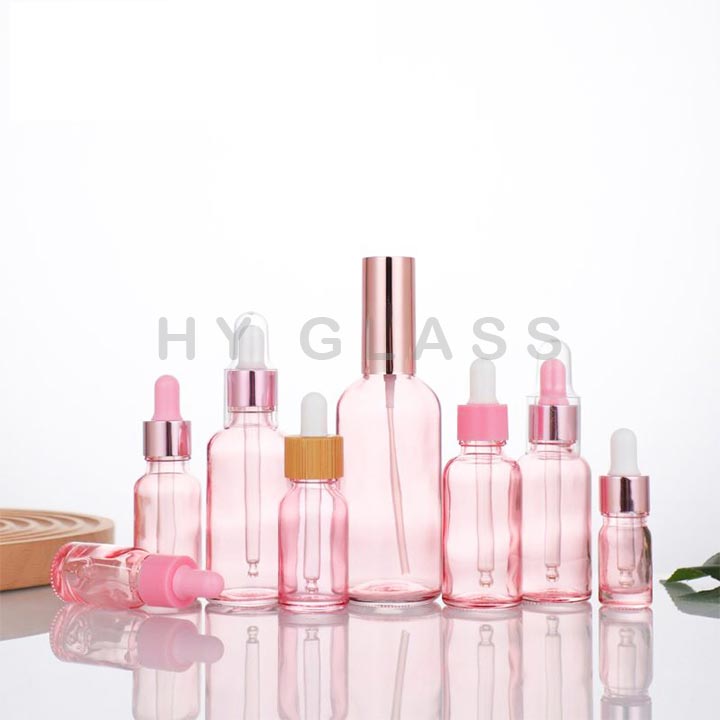 Customize 5ml-100ml pink glass essential oil dropper bottle factory